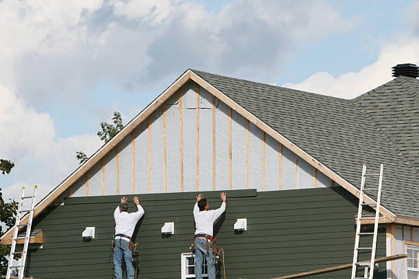 Professional Emergency Siding Repair technician working in Providence Forge, VA